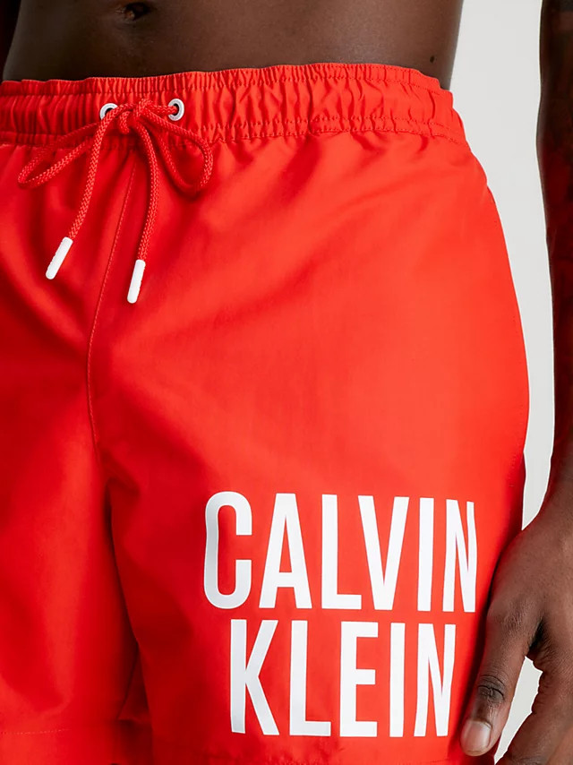 Pánské střední plavecké šortky se stahovací šňůrkou KM0KM00794 XNE červená - Calvin Klein M