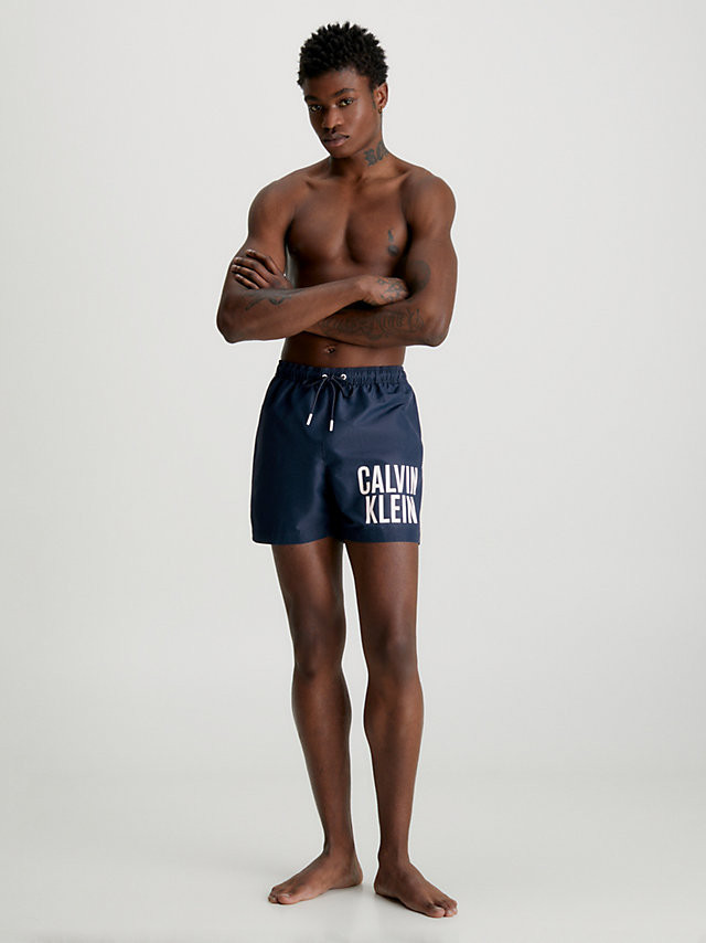 Pánské střední plavecké šortky se stahovací šňůrkou KM0KM00794 XNE tm. modrá - Calvin Klein L