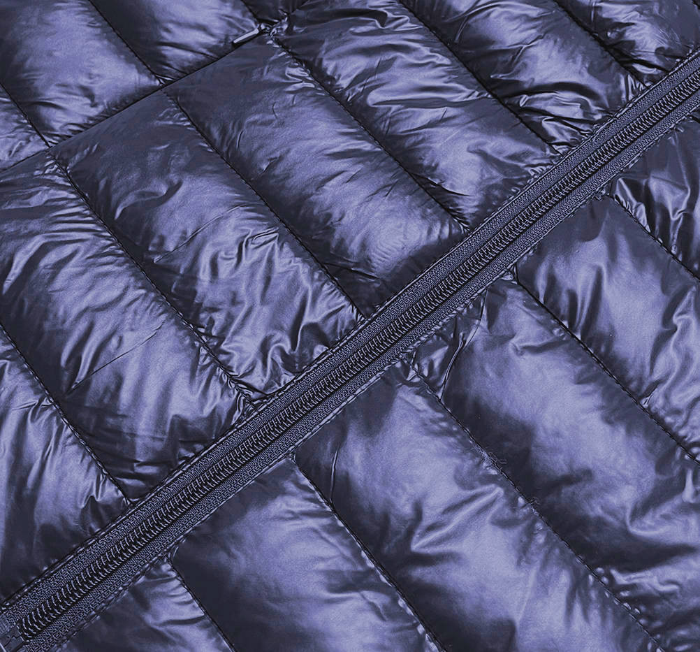 Tmavě modrá lehká prošívaná dámská bunda (5M706-215) Barva: odcienie niebieskiego, Velikost: M (38)