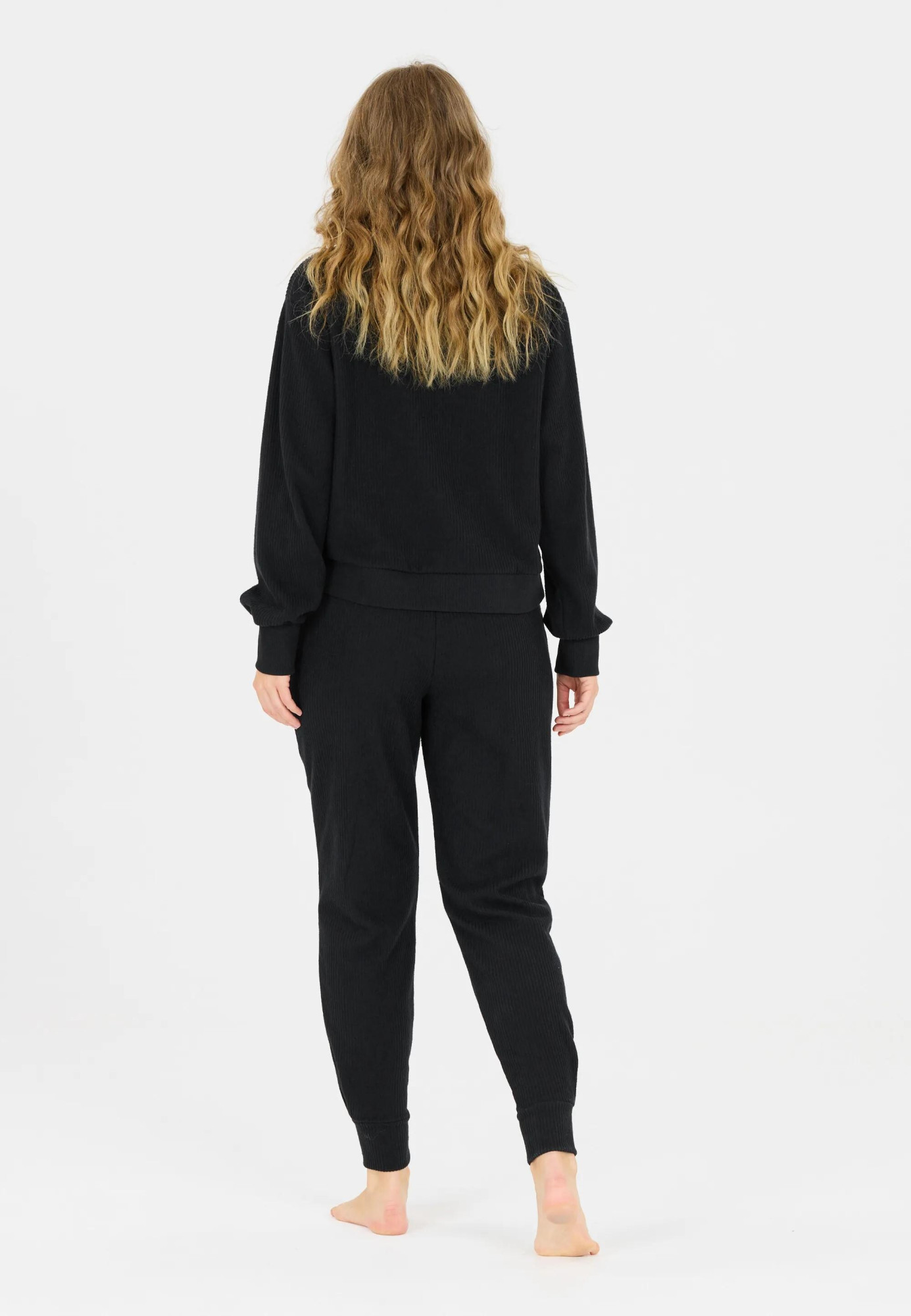 Athlecia Hecey Dámske tepláky 38