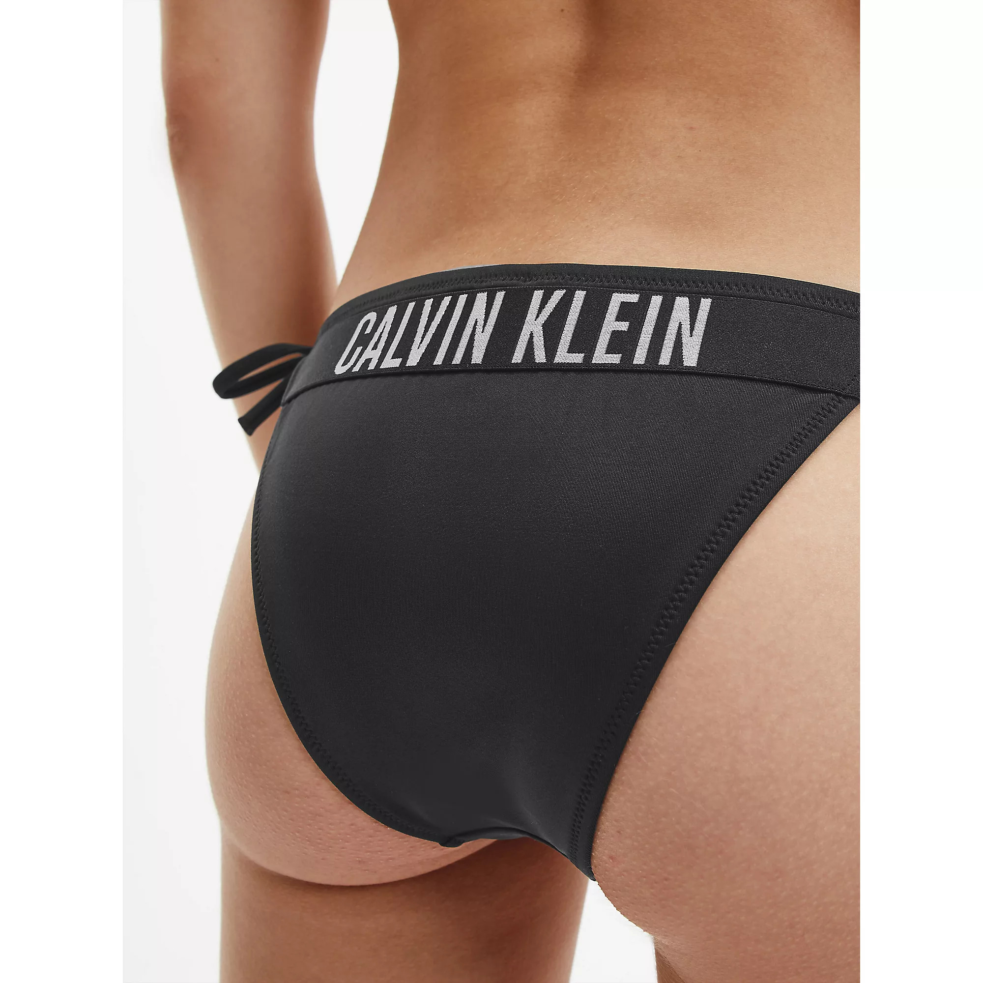 Dámské plavky Spodní díl plavek STRING SIDE TIE CHEEKY BIKINI KW0KW01858BEH - Calvin Klein XXS