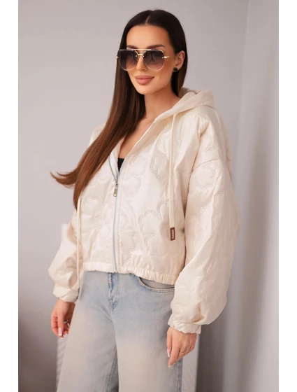 Dámská prošívaná bunda s kapucí a ozdobným květinovým model 21998360 béžová - K-Fashion