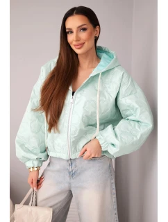 Dámská bunda prošívaná s kapucí a ozdobným květinovým vzorem mátová