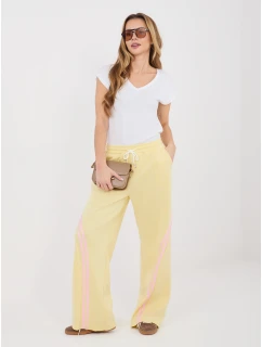 Spodnie dresowe IT DR model 22031476 jasny żółty - FPrice