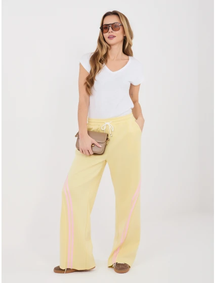 Spodnie dresowe IT DR model 22031476 jasny żółty - FPrice