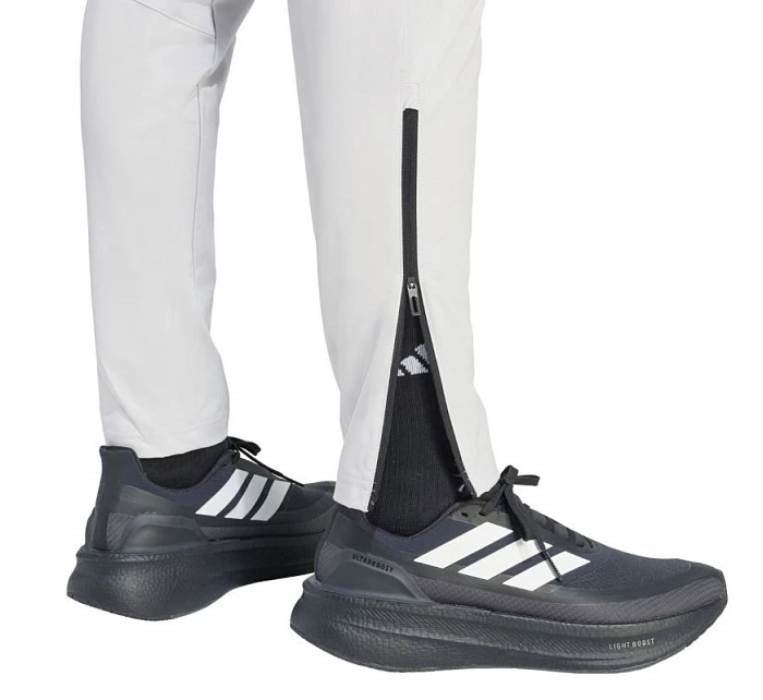 Pánské kalhoty Tiro 26 Travel Woven světle šedé model 22062493 - ADIDAS Pánské kalhoty Tiro 26 Travel Woven světle šedé model 22062493 - ADIDAS