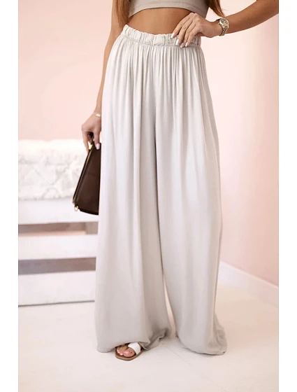 Široké dámské kalhoty s elastickým pasem tmavě béžová