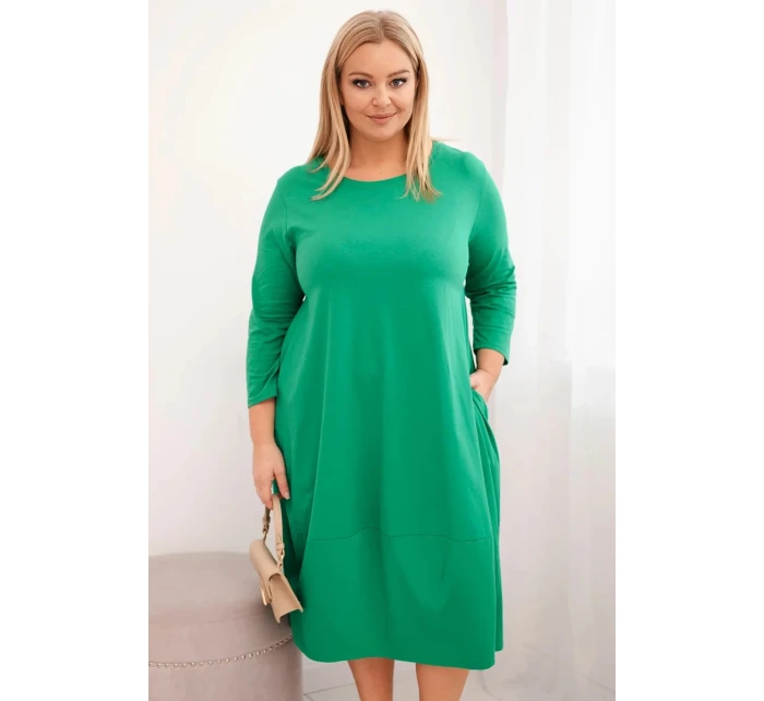 Dámská bavlněná sukně Plus Size s ohrnovacími rukávy a kapsami zelená Dámská bavlněná sukně Plus Size s ohrnovacími rukávy a kapsami zelená