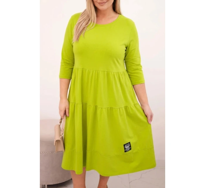 Dámská bavlněná sukni Plus Size s volány a ohrnutým rukávem pistáciová Dámská bavlněná sukni Plus Size s volány a ohrnutým rukávem pistáciová