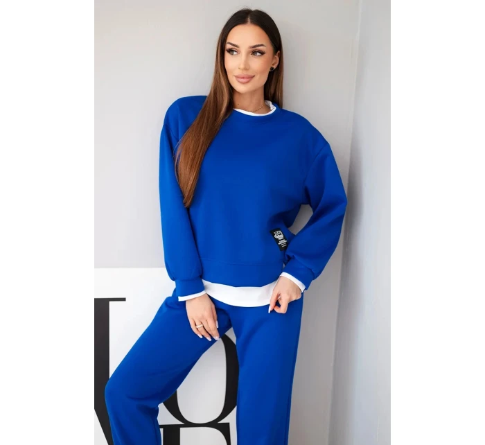 Dámský komplet s máslovou barvou s volnou mikinou a tepláky modrý Dámský komplet s máslovou barvou s volnou mikinou a tepláky modrý
