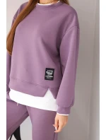 Dámský komplet s máslovou barvou s volnou mikinou a tepláky fialový Dámský komplet s máslovou barvou s volnou mikinou a tepláky fialový