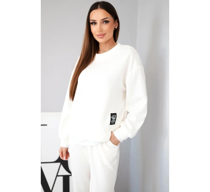 Dámský komplet s model 21808641 volnou mikinou a tepláky ecru - K-Fashion Dámský komplet s model 21808641 volnou mikinou a tepláky ecru - K-Fashion