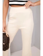Dámské kalhoty máslo s rozšiřující se nohavicí béžové