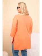 Dámská bavlněná blůza Plus Size asymetrická s náhrdelníkem meruňková Dámská bavlněná blůza Plus Size asymetrická s náhrdelníkem meruňková