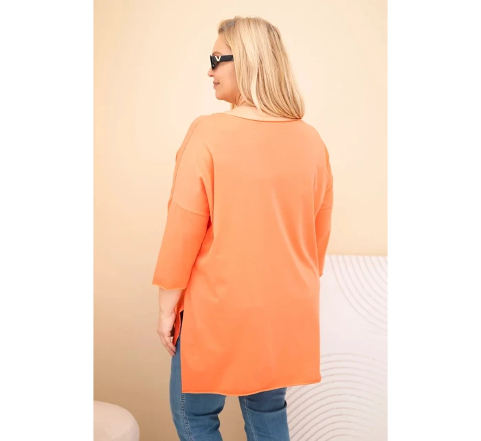 Dámská bavlněná blůza Plus Size asymetrická s náhrdelníkem meruňková Dámská bavlněná blůza Plus Size asymetrická s náhrdelníkem meruňková