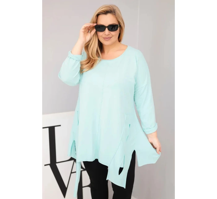 Dámská bavlněná blůza Plus Size s asymetrickým spodním lemem a výřezy mátová Dámská bavlněná blůza Plus Size s asymetrickým spodním lemem a výřezy mátová