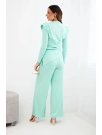 Dámská bavlněná souprava s halenkou a kalhotami s širokými nohavicemi mátová Dámská bavlněná souprava s halenkou a kalhotami s širokými nohavicemi mátová