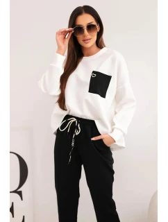 Dámská souprava máslová s kontrastní kapsou černý