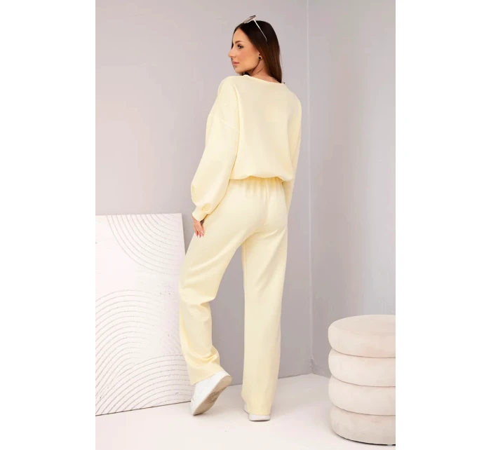 Dámský set mikina s broží a kalhoty s nohavicí žlutý model 21921250 - K-Fashion Dámský set mikina s broží a kalhoty s nohavicí žlutý model 21921250 - K-Fashion