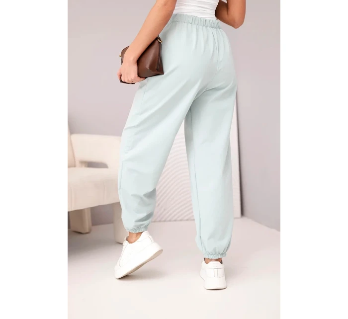 Dámské bavlněné kalhoty s vysokým pasem a ozdobným knoflíkem tmavě mátové Dámské bavlněné kalhoty s vysokým pasem a ozdobným knoflíkem tmavě mátové