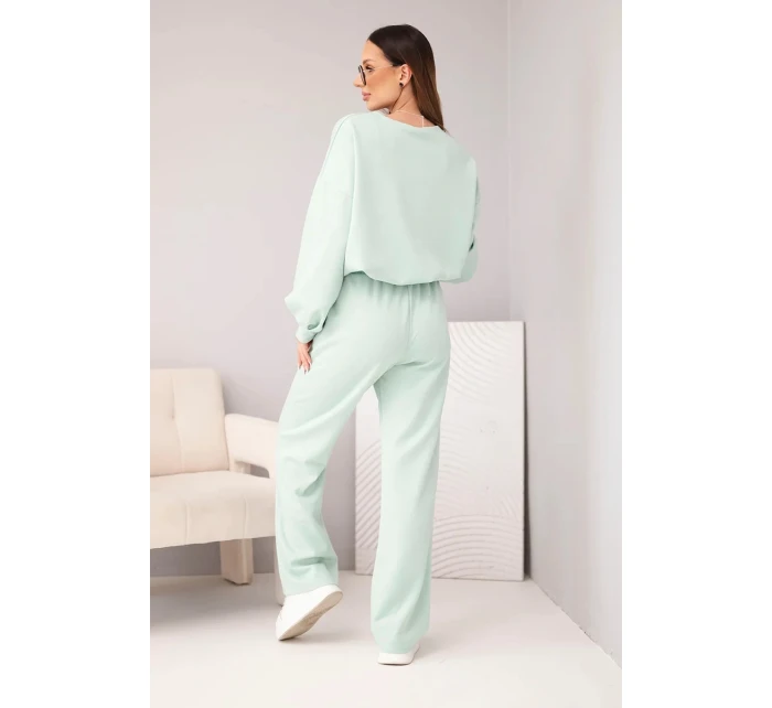 Dámský komplet máslová mikina s broží a kalhoty s model 21949314 nohavicí tmavě mátová - K-Fashion Dámský komplet máslová mikina s broží a kalhoty s model 21949314 nohavicí tmavě mátová - K-Fashion