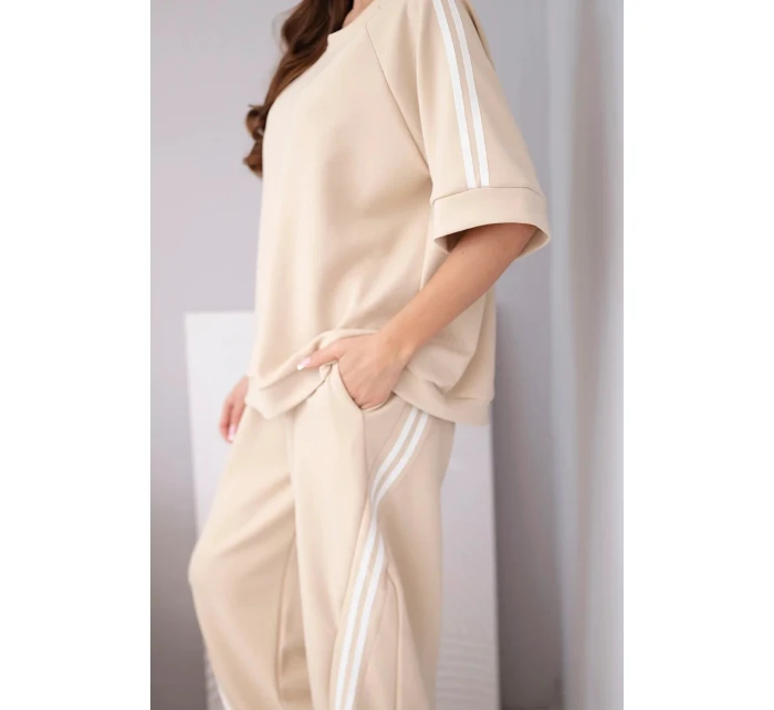 Dámský komplet máslový z viskózy mikina a kalhoty s lampasy béžový Dámský komplet máslový z viskózy mikina a kalhoty s lampasy béžový