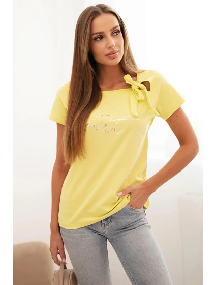 Dámská bavlněná halenka s mašlí na rameni a s potiskem žlutá Dámská bavlněná halenka s mašlí na rameni a s potiskem žlutá