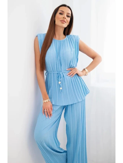 Dámský viskózový plisovaný komplet se zavazovací halenkou a širokými kalhotami modrý Dámský viskózový plisovaný komplet se zavazovací halenkou a širokými kalhotami modrý
