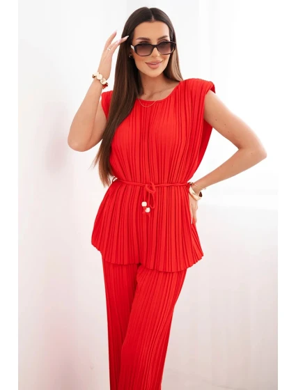 Dámský viskózový plisovaný komplet s vázanou halenkou a širokými kalhotami červený Dámský viskózový plisovaný komplet s vázanou halenkou a širokými kalhotami červený