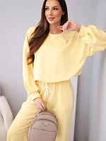 Dámský komplet máslová mikina s broží a kalhoty s rovnými nohavicemi citronový