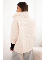 Dámská jarní prošívaná bunda s ozdobnou ražbou a zipem světle béžová