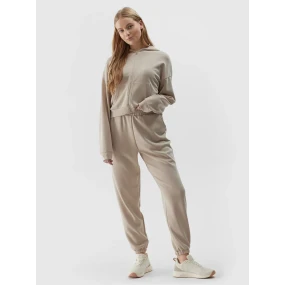 Dámské tepláky typu jogger s přídavkem model 20437532 béžové - 4F Dámské tepláky typu jogger s přídavkem model 20437532 béžové - 4F