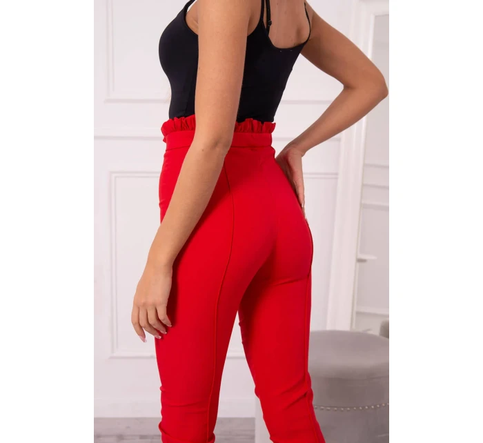 Červené plisované kalhoty