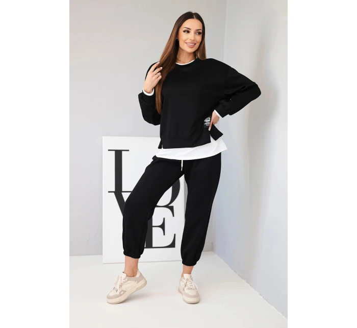 Dámský komplet s máslovou barvou, volnou mikinou a tepláky černý Dámský komplet s máslovou barvou, volnou mikinou a tepláky černý