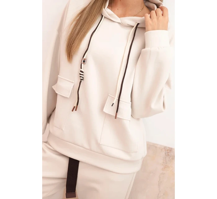 Komplet dámský máslový mikina s kapucí a kalhoty s páskem béžový Komplet dámský máslový mikina s kapucí a kalhoty s páskem béžový