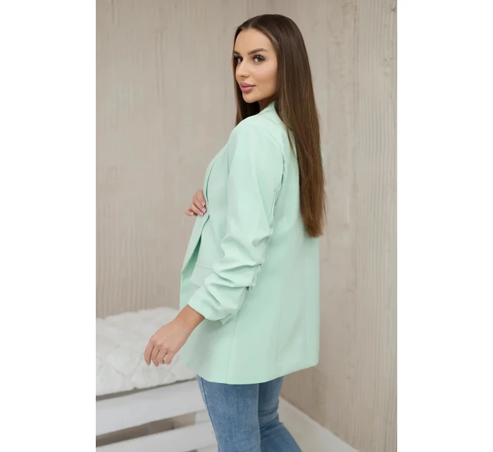 Bunda s klopou elegantní světlá máta Bunda s klopou elegantní světlá máta