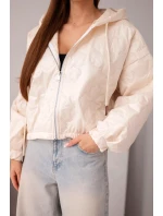 Dámská prošívaná bunda s kapucí a ozdobným květinovým ražením béžová