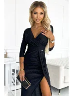 Lesklé černé dlouhé dámské šaty s výstřihem, rozparkem na noze a s brokátem model 18960458 - numoco Lesklé černé dlouhé dámské šaty s výstřihem, rozparkem na noze a s brokátem model 18960458 - numoco