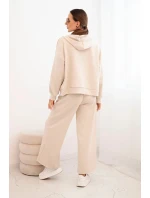 Dámský komplet máslový s širokými nohavicemi a mikinou na zip béžový Dámský komplet máslový s širokými nohavicemi a mikinou na zip béžový