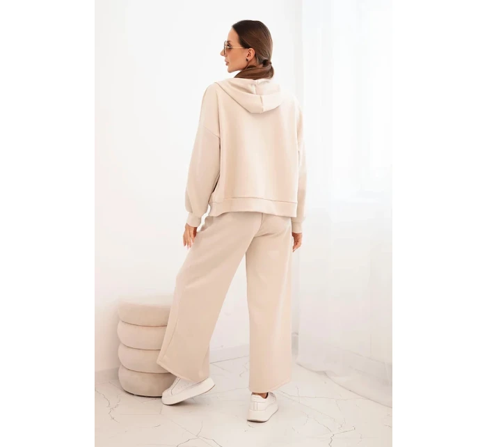 Dámský komplet máslový s širokými nohavicemi a mikinou na zip béžový Dámský komplet máslový s širokými nohavicemi a mikinou na zip béžový