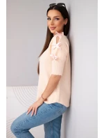 Dámský svetr s krátkým rukávem a ozdobnými mašličkami lososový