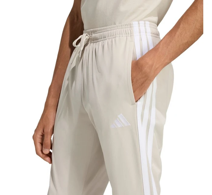 Pánské kalhoty 3Stripes Tricot Regular Tapered béžové model 22063052 - ADIDAS Pánské kalhoty 3Stripes Tricot Regular Tapered béžové model 22063052 - ADIDAS