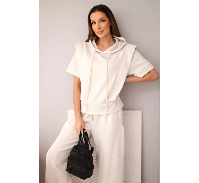 Dámská máslová souprava mikina s kapucí a volné kalhoty se šňůrkou béžový