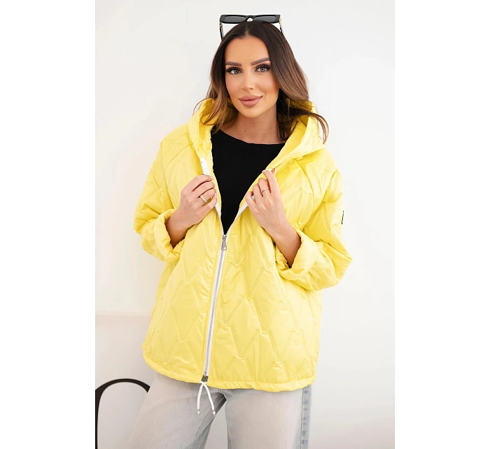 Dámská jarní prošívaná bunda s kapucí a zipem tmavě žlutá