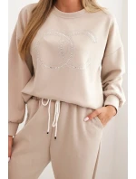 Dámský komplet z viskózy s ozdobným motivem a kalhotami béžový Dámský komplet z viskózy s ozdobným motivem a kalhotami béžový