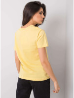 Žluté tričko s nášivkami