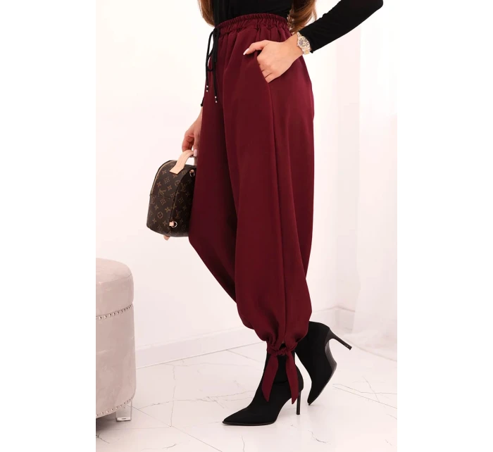 Dámské kalhoty s širokým nohavicí a zavazováním dole bordové