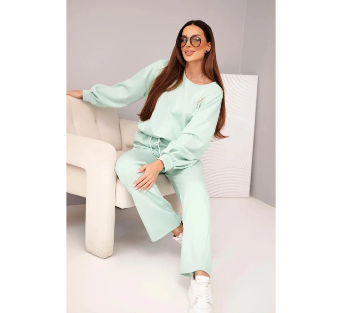 Dámský komplet máslová mikina s broží a kalhoty s rovnou nohavicí tmavě mátová Dámský komplet máslová mikina s broží a kalhoty s rovnou nohavicí tmavě mátová