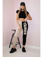 Dámské tepláky s nápisem QUEEN černý