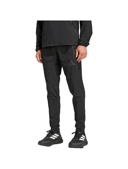 Pánské kalhoty Tiro 26 Travel Woven černé model 22062461 - ADIDAS Pánské kalhoty Tiro 26 Travel Woven černé model 22062461 - ADIDAS